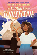 A girl stands looking out while petting a horse behind a fence. Behind the horse is a pink sky and purple mountains.