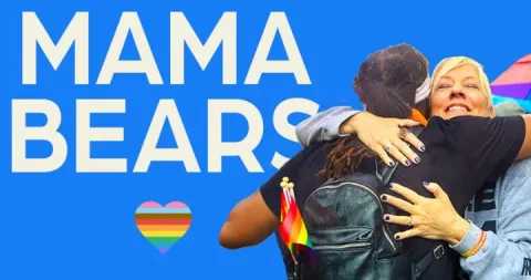 The text Mama Bears and two people hugging, featuring a rainbow heart