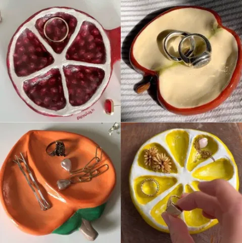 From top left, clockwise: Clay dish of a pomegranate, clay dish of an apple, clay dish of a lemon, clay dish of a peach