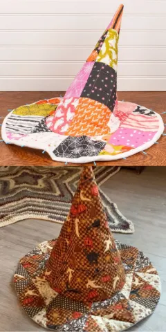 Two examples of handmade quilted witch hats using various fabric patterns.