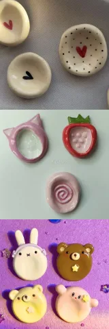 Three examples of different designs of worry stones.